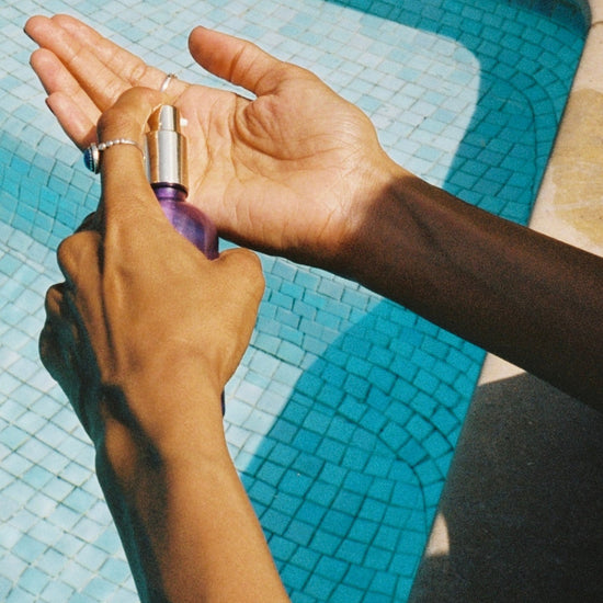 Dispensing THE SUPER SERUM into palm